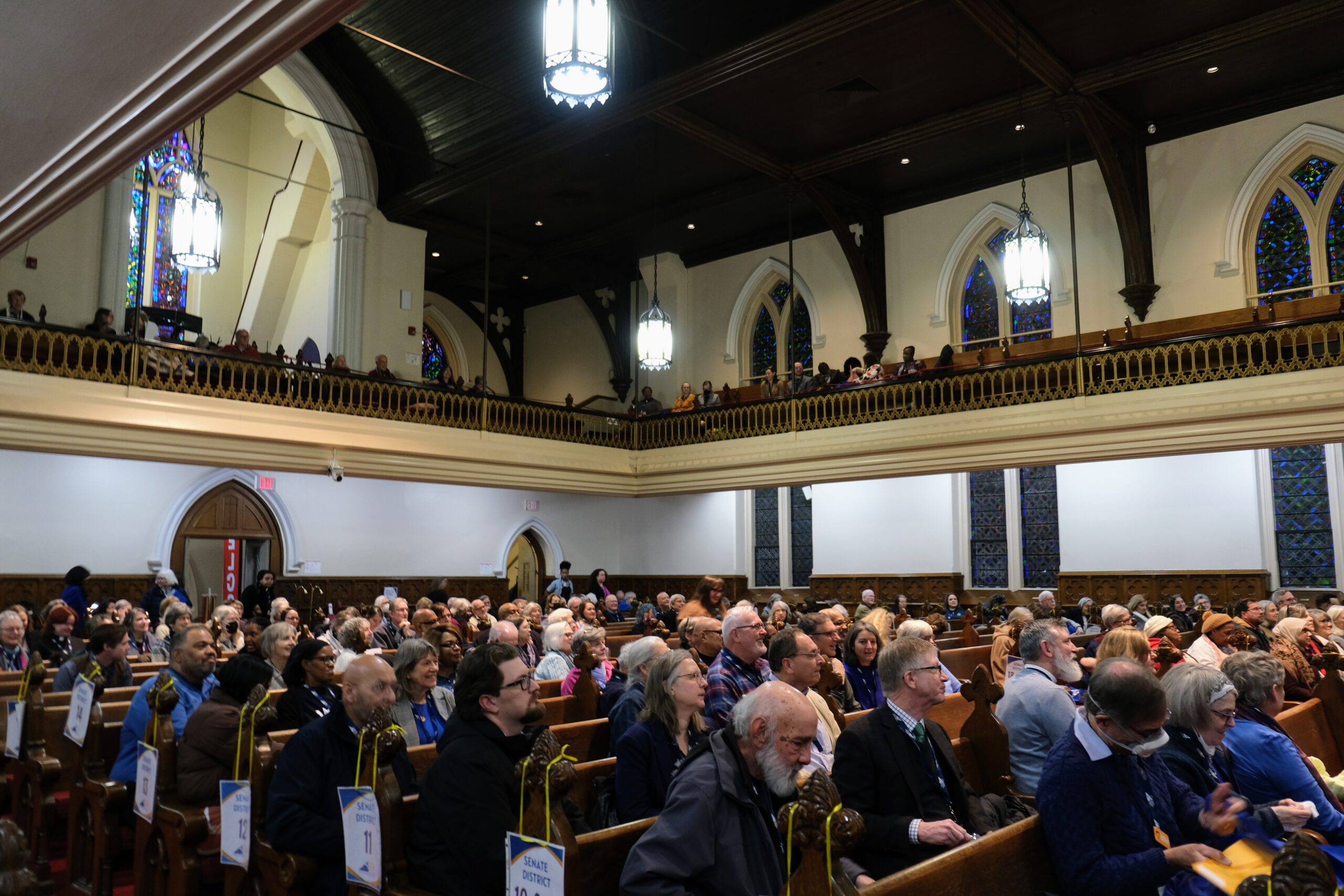 crowd of people in church pews