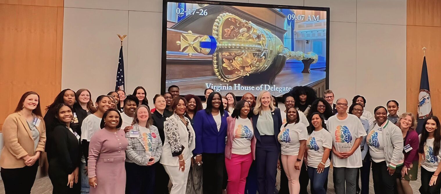 many women surrounding Governor Spanberger at the General Assembly