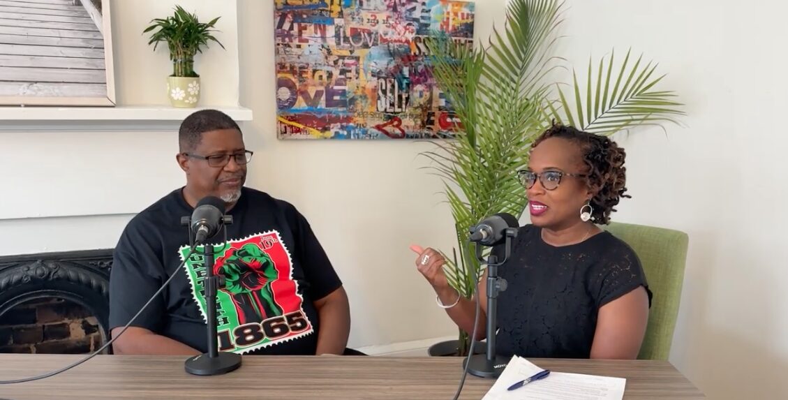man and woman talking during a podcast