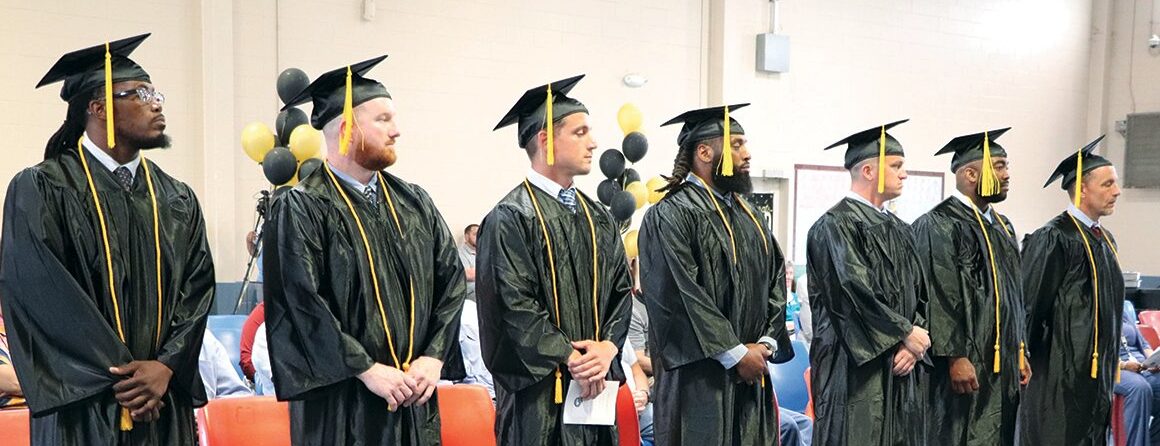 graduates in cap and gown